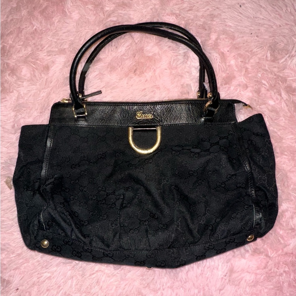 Gucci Black Shoulder Bag with Gold Accents